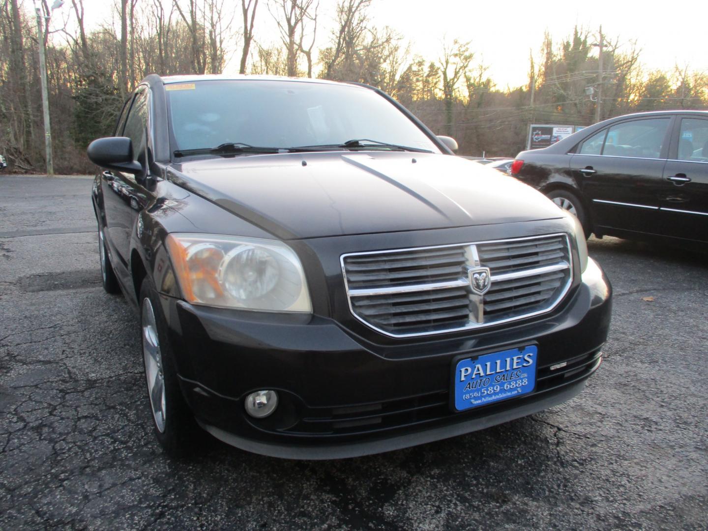 2011 BLACK Dodge Caliber Uptown (1B3CB9HB0BD) with an 2.4L L4 DOHC 16V engine, Continuously Variable Transmission transmission, located at 540a Delsea Drive, Sewell, NJ, 08080, (856) 589-6888, 39.752560, -75.111206 - Photo#8